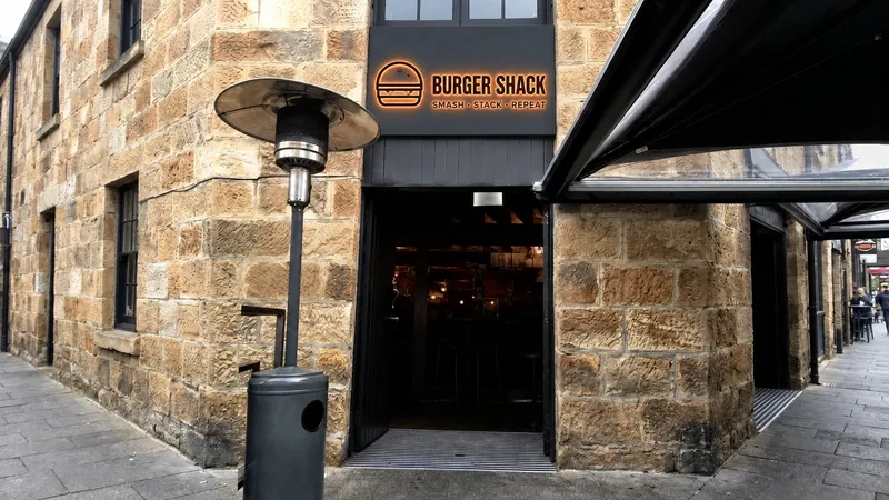 Burger Shack entrance on a sandstone laneway